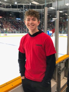 boy at hockey rink