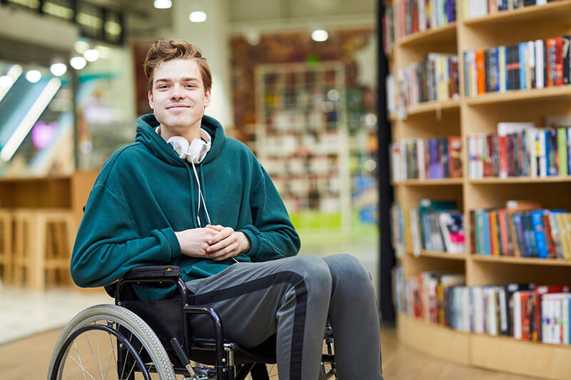 guy in wheelchair smiling
