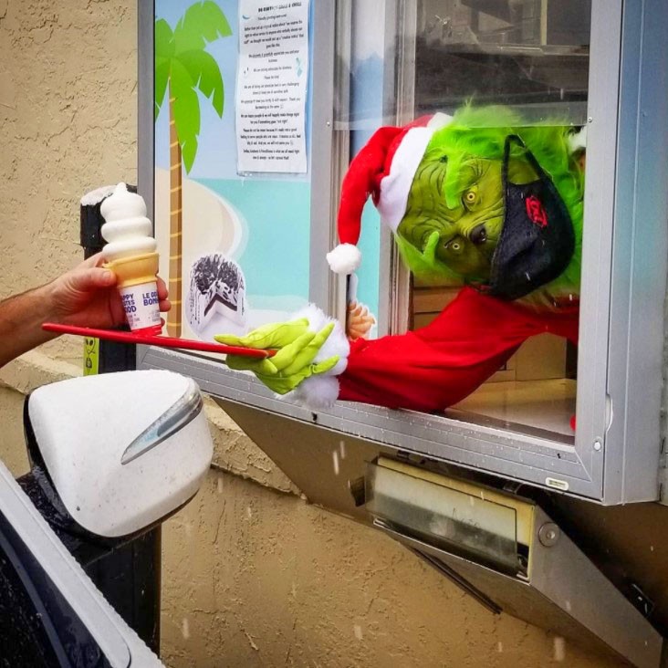 Grinch giving away ice cream at Dairy Queen drive through